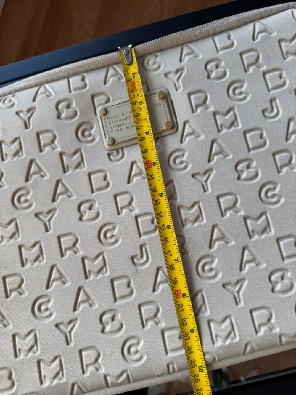 13” Marc by Marc Jacobs Cream Embossed Logo Laptop Sleeve with Gold Plate